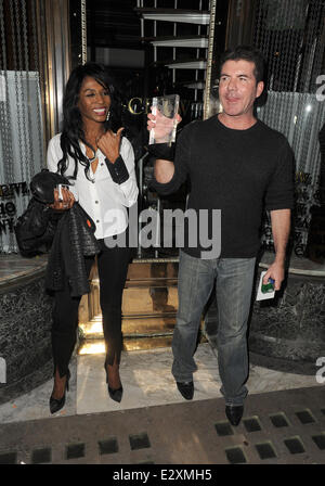 Simon Cowell and Sinitta leaving Mr Chow restaurant in Knightsbridge together.  Featuring: Simon Cowell,Sinitta Where: London, United Kingdom When: 27 Mar 2013 Stock Photo