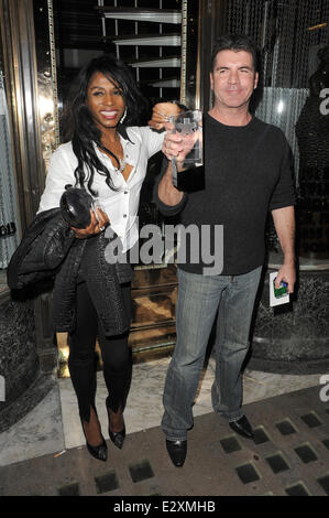 Simon Cowell and Sinitta leaving Mr Chow restaurant in Knightsbridge together.  Featuring: Simon Cowell,Sinitta Where: London, United Kingdom When: 27 Mar 2013 Stock Photo