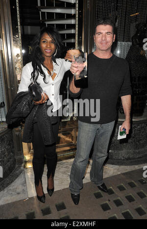 Simon Cowell and Sinitta leaving Mr Chow restaurant in Knightsbridge together.  Featuring: Simon Cowell,Sinitta Where: London, United Kingdom When: 27 Mar 2013 Stock Photo