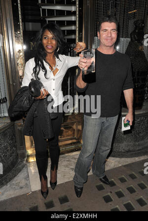 Simon Cowell and Sinitta leaving Mr Chow restaurant in Knightsbridge together.  Featuring: Simon Cowell,Sinitta Where: London, United Kingdom When: 27 Mar 2013 Stock Photo