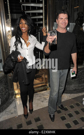 Simon Cowell and Sinitta leaving Mr Chow restaurant in Knightsbridge together.  Featuring: Simon Cowell,Sinitta Where: London, United Kingdom When: 27 Mar 2013 Stock Photo