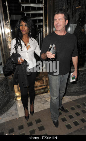 Simon Cowell and Sinitta leaving Mr Chow restaurant in Knightsbridge together.  Featuring: Simon Cowell,Sinitta Where: London, United Kingdom When: 27 Mar 2013 Stock Photo