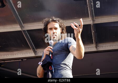 London, UK. 21st June, 2014. The People's Assembly held a march through London followed by a rally in Parliament Square to call for a stop to cuts and austerity politics.  Russell Brand Credit:  Rachel Megawhat/Alamy Live News
