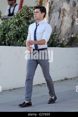 Actor Zac Efron sports skinny pants on the set of 'Townies' filming in Los Angeles with co star Dave Franco and producer Seth Rogen who is also part of the cast.  Featuring: Zac Efron Where: Los Angeles, CA, United States When: 04 Apr 2013 Stock Photo