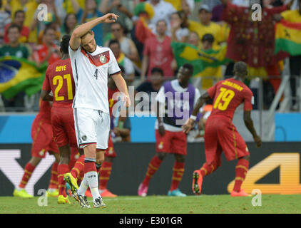 Fortaleza, Brazil. 21st June, 2014. Germany's Benedikt Hoewedes reacts during the FIFA World Cup 2014 group G preliminary round match between Germany and Ghana at the Estadio Castelao Stadium in Fortaleza, Brazil, 21 June 2014. Photo: Thomas Eisenhuth/dpa/Alamy Live News Stock Photo