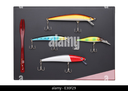 plastic fishing lure on plate Stock Photo