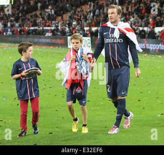 David Beckham plays his last match before retirement with Paris St. Germain (PSG) where the team beat Brest. Paris St Germain (Brest PSG) resulting in them winning the French league  Featuring: Cruz Beckham,David Beckham,Romeo Beckham Where: Paris, France Stock Photo