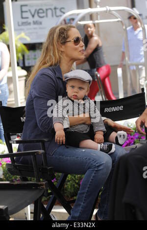 Elizabeth Berkley on the set of Extra! with her son Sky Lauren  Featuring: Elizabeth Berkley Where: Los Angeles, California, United States When: 07 Jun 2013 Stock Photo