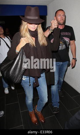 Celebrities arriving at LAX Airport  Featuring: Heidi Klum,Martin Kristens Where: Los Angeles, California, United States When: 07 Jun 2013 Stock Photo