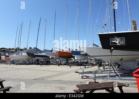 Cowes Yacht Haven between major races. Yachts are out of the water being maintained and  Cowes seems relaxed.  Featuring: Cowes Yacht Haven Where: London, United Kingdom When: 10 Jun 2013 Stock Photo