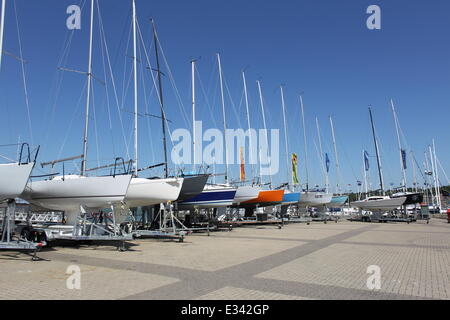 Cowes Yacht Haven between major races. Yachts are out of the water being maintained and  Cowes seems relaxed.  Featuring: Cowes Yacht Haven Where: London, United Kingdom When: 10 Jun 2013 Stock Photo