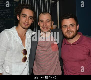 The cast of Love/Hate, both alive and dead, have a drink with Tom Vaughan Lawlor after his performance in the Mark O'Rowe play 'Howie The Rookie' at the Project Arts Centre  Featuring: Robert Sheehan,Tom Vaughan Lawlor,Laurence Kinlan Where: Dublin, Ireland When: 18 Jun 2013 Stock Photo