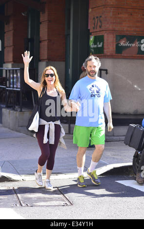 Leslie Mann and Judd Apatow walk hand in hand while out and about in Manhattan. The couple seemed in good spirits and goofed aro Stock Photo