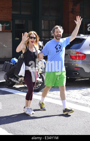 Leslie Mann and Judd Apatow walk hand in hand while out and about in Manhattan. The couple seemed in good spirits and goofed around for the camera  Featuring: Leslie Man,Judd Apatow Where: Manhattan, NY, United States When: 21 Jun 2013 Stock Photo