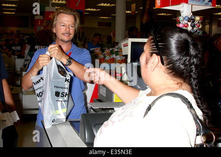 David Spade works as a Kmart clerk for charity to promote 'Grown Ups 2'  Featuring: David Spade Where: Los Angeles, CA, United States When: 03 Jul 2013 Stock Photo