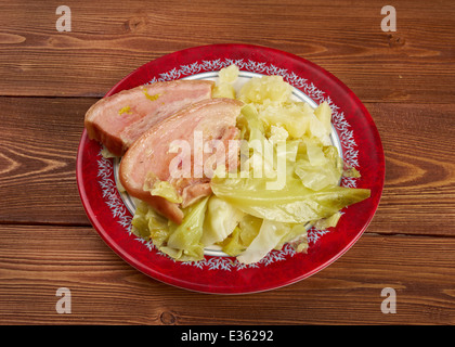 Bacon and cabbage - dish traditionally associated with Ireland. back bacon boiled with cabbage and potatoes. Stock Photo