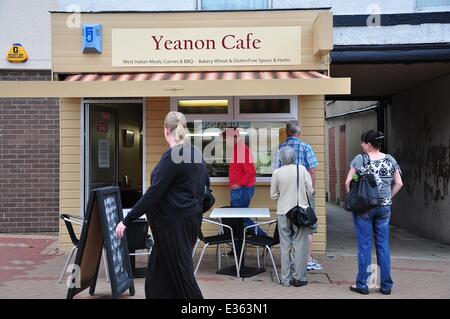 Cafe owner Martha-Renee Kolleh got fed up of racist remarks and  took matters into her own hands and has placed the sign on the door of the Yeanon Cafe, in Ossett, West Yorkshire, which reads: 'I am a black woman...If you are allergic to black people, don't come in. 'But, if you prefer quality wholesome meals in a pleasant and clean environment, come in. I don't bite!'  Where: West Yorkshire, United Kingdom When: 10 Jul 2013 Stock Photo