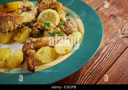 Kotopoulo Lemonato.Greek Lemon Chicken with Crispy Potatoes  Stock Photo