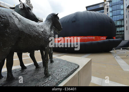 Paternoster Square, London, UK. 22nd June 2014. The giant inflated bowler hat is a venue for the City of London Festival which begins tomorrow on the 23rd of June. Credit:  Matthew Chattle/Alamy Live News Stock Photo