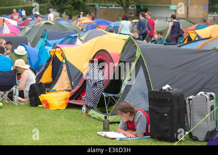 Wimbledon Park, London, UK. 22nd June, 2014. Tennis enthusiasts camp in Wimbledon Park overnight hoping to get a ticket for the opening match in Centre Court to see Andy Murray defend his title. Credit:  Clickpics/Alamy Live News Stock Photo