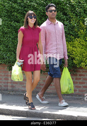 Jasmyn Banks and Himesh Patel take a walk through a sunny Borehamwood after taking a break from filming 'Eastenders' to grab some lunch  Featuring: Jasmyn Banks,Himesh Patel Where: Borehamwood, Hertfordshire, United Kingdom When: 15 Jul 2013 Stock Photo