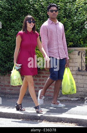 Jasmyn Banks and Himesh Patel take a walk through a sunny Borehamwood after taking a break from filming 'Eastenders' to grab some lunch  Featuring: Jasmyn Banks,Himesh Patel Where: Borehamwood, Hertfordshire, United Kingdom When: 15 Jul 2013 Stock Photo