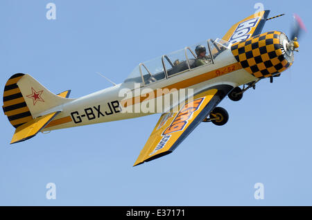 Yakovlev Yak 52 Soviet Russian training plane flying Stock Photo