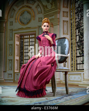 3D computer graphics of a young woman with a pink dress from the 19th century Stock Photo