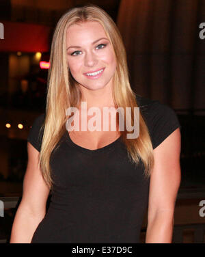 Nikki Leigh and Steve Samblis pose for pictures outside the Grand Havana  Club in Beverly Hills