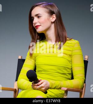 Lily Collins discusses 'The Mortal Instruments: City of Bones,' her new film about half-angel warriors who protect our world from demons.  Featuring: Lily Collins Where: New York City, NY, United States When: 06 Aug 2013 Stock Photo