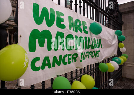 Belfast City Hall,UK. 22nd June 2014. We are Macmillan Cancer banner at the finish line of the 6 Marathons in 6 Countries in 6 Days Stock Photo