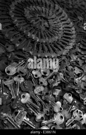 Close up of keys piles with shallow depth of field. Dramatic image with patterns. Dramatic, moody black and white photograph Stock Photo