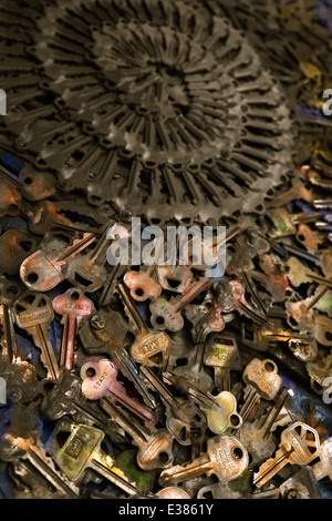 Close up of keys piles with shallow depth of field. Dramatic image with patterns.  Richly colored tinted vertical photograph Stock Photo