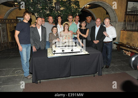 Cast and crew of NCIS: LOS ANGELES on set for a cake-cutting to celebrate the filming of their 100th episode.  (Episode to air on Tuesday, October 15th)  Featuring: Eric Christian Olsen,R. Scott Gemmill,John Peter Kousakis,Chris O'Donnell,Daniela Ruah,Linda Hunt,Renée Felice Smith,Barrett Foa,LL Cool J,Shane Brennan Where: LA, CA, United States When: 23 Aug 2013 Stock Photo