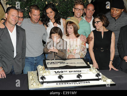 Cast and crew of NCIS: LOS ANGELES on set for a cake-cutting to celebrate the filming of their 100th episode.  (Episode to air on Tuesday, October 15th)  Featuring: Eric Christian Olsen,R. Scott Gemmill,John Peter Kousakis,Chris O'Donnell,Daniela Ruah,Lin Stock Photo