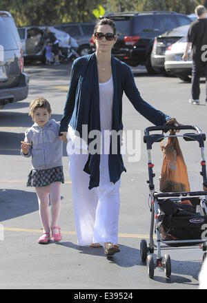 Actress, Carrie-Anne Moss and her daughter heading to the local Farmers Market in Brentwood  Featuring: Carrie-Anne Moss Where: Brentwood, CA, United States When: 25 Aug 2013 Stock Photo