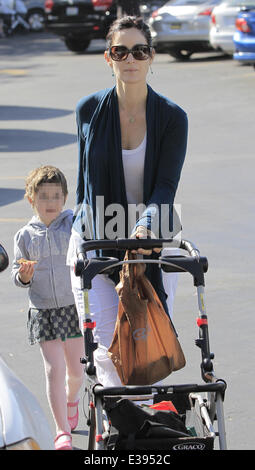 Actress, Carrie-Anne Moss and her daughter heading to the local Farmers Market in Brentwood  Featuring: Carrie-Anne Moss Where: Brentwood, CA, United States When: 25 Aug 2013 Stock Photo