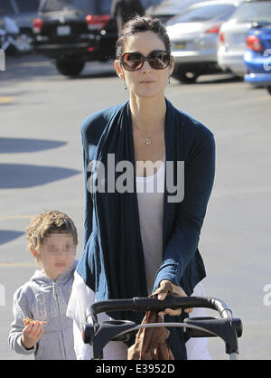 Actress, Carrie-Anne Moss and her daughter heading to the local Farmers Market in Brentwood  Featuring: Carrie-Anne Moss Where: Brentwood, CA, United States When: 25 Aug 2013 Stock Photo