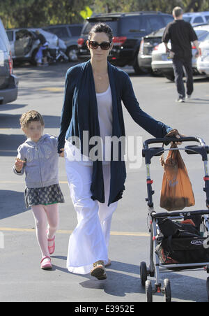 Actress, Carrie-Anne Moss and her daughter heading to the local Farmers Market in Brentwood  Featuring: Carrie-Anne Moss Where: Brentwood, CA, United States When: 25 Aug 2013 Stock Photo