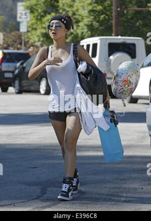 Brenda Song all dressed up as she heads for a birthday party in Beverly Hills  Featuring: Brenda Song Where: Los Angeles, CA, United States When: 25 Aug 2013 Stock Photo