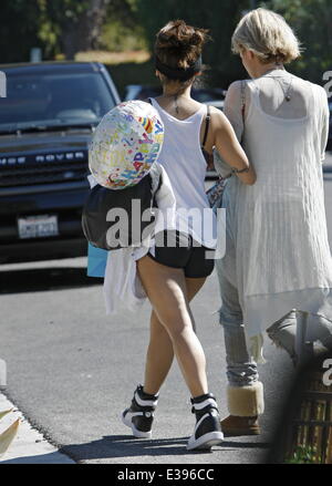 Brenda Song all dressed up as she heads for a birthday party in Beverly Hills  Featuring: Brenda Song Where: Los Angeles, CA, United States When: 25 Aug 2013 Stock Photo