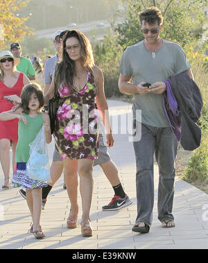 Tia Carrere and her family leaving the 32nd Annual Malibu Kiwanis Chili Cook-Off  Featuring: Tia Carrere,Bianca,Simon Wakelin Where: Malibu, California, United States When: 01 Sep 2013 Stock Photo