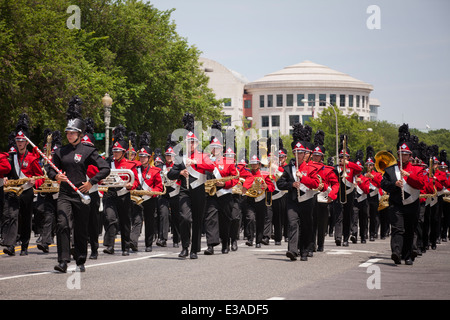 High school marching band in formation in parade - USA Stock Photo