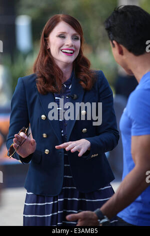 Bryce Dallas Howard appears the on Extra TV show hosted by Mario Lopez.  Featuring: Bryce Dallas Howard,Mario Lopez Where: Los Angeles, CA, United States When: 11 Sep 2013 Stock Photo