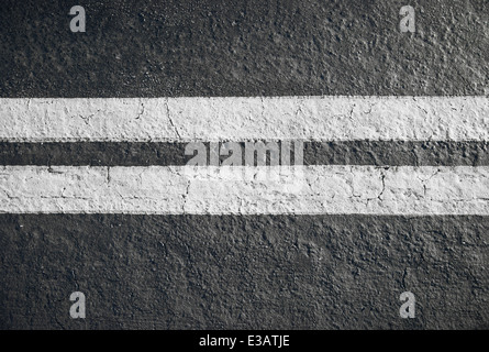 double white lines divider on blacktop horizontal Stock Photo