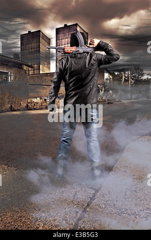 masked terrorist or separatist with a kalashnikov submachine gun Stock Photo