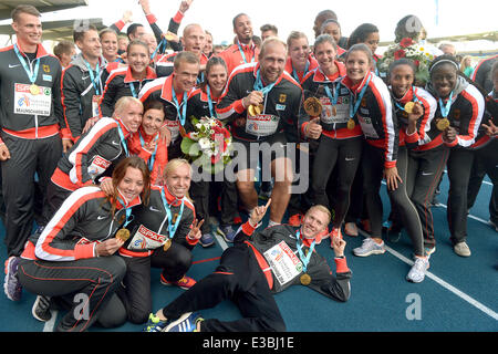Braunschweig, Germany. 22nd June, 2014. The German team celebrates the victory in the European Athletics Team Championships in the Eintracht Stadion in Braunschweig, Germany, 22 June 2014. Photo: Peter Steffen/dpa/Alamy Live News Stock Photo