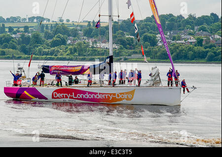Derry, Londonderry, Northern Ireland - 23 June 2014. Derry - Londonderry Clipper wins home leg of World Yacht Race. The Derry-Londonderry-Doire clipper, captained by Sean McCarter, arrives on the River Foyle after finishing in first place in 2,800 mile Race 14 (in the 16 series race), from New York, in the Clipper Round the World yacht race. Thousands of people greeted the yacht's arrival as part of the LegenDerry Maritime Festival. Credit: George Sweeney / Alamy Live News Stock Photo