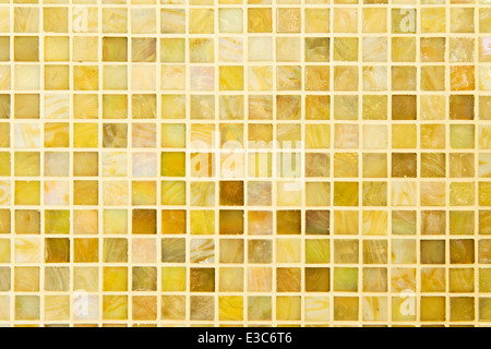 Texture: Beautiful yellow modern mosaic tile on wall. Stock Photo