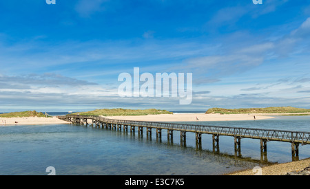 BRIDGE OVER THE RIVER LOSSIE TO THE EAST BEACH AT LOSSIEMOUTH MORAY COAST SCOTLAND Stock Photo